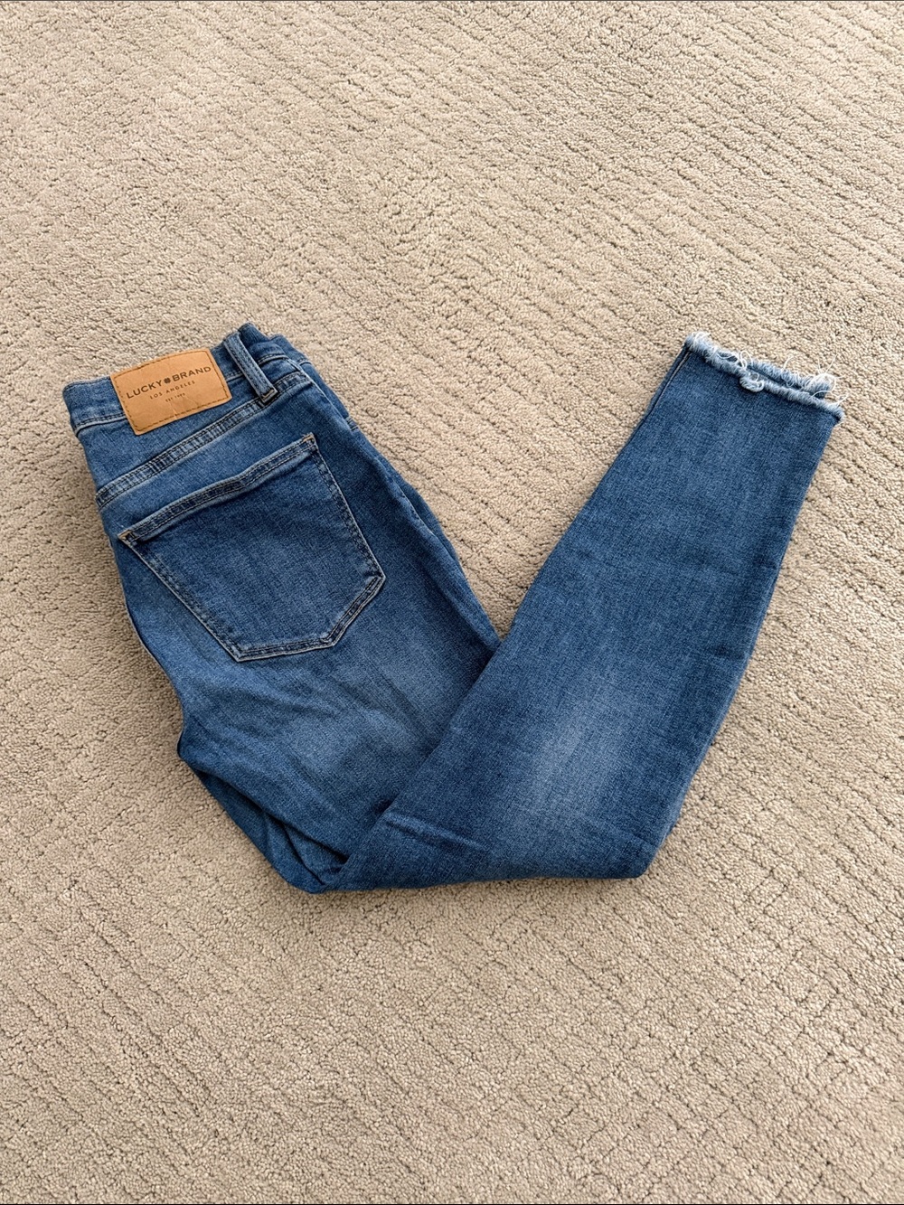 Lucky Brand Mid Blue Skinny Jeans with Frayed Ankles